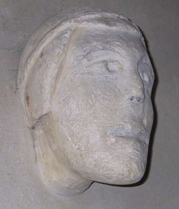 Carved stone head