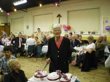 Ruby cutting the cake